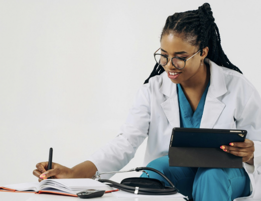 Nurse Taking Notes on a Notepad